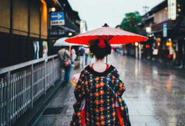 Geiko and Maiko walking in Gion Kyoto traditional geisha district