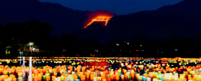 Gozan no Okuribi Daimonji giant mountain bonfire illuminating the night sky in Kyoto